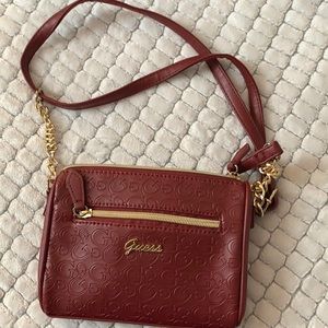 Maroon and gold guess mini bag